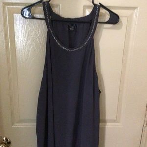 Gray sleeveless blouse